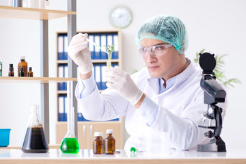 Biotechnology concept with scientist in lab