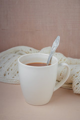 Cup of cacao on a wooden table.