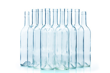 Group of empty glass bottles isolated on white