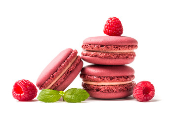 Closeup of macaroons with raspberries with mint