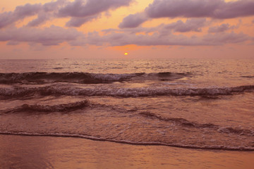 Delicate sunset on the island in the ocean.