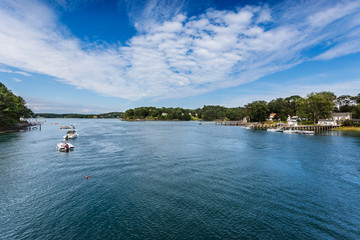 Fototapeta na wymiar Looking inland up Spruce Creek, Maine on a sunny summer afternoon