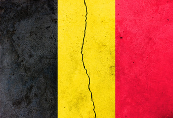 A crack in the wall. Flag of Belgium