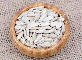 Sunflower seeds in a bamboo bowl