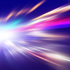 Traffic lights in motion blur at night.