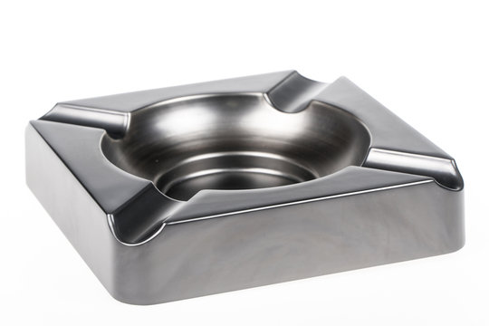 Empty metal ash tray on white background