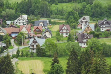 Obraz premium Summer landscape with huts