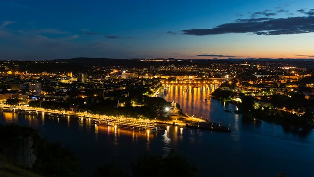 Timelapse sequence of Deutsches Eck and the oldtown of Koblenz, Germany with  Rhine and Moselle River in the night in 4K.