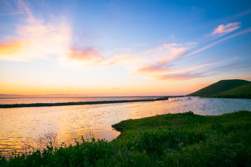 Sunset Coyote Hills Regional State Park.  San Francisco bay area.  Salt ponds.