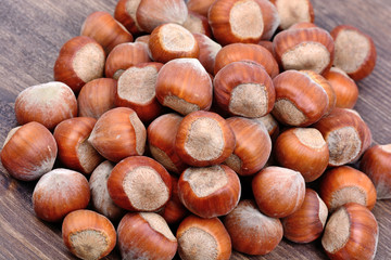 Group of hazelnuts on table