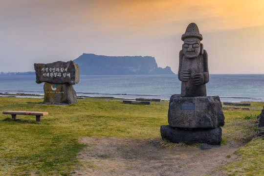 Dol hareubang statue and Jeju-do Seongsan Ilchulbong, Jeju Island, South Korea