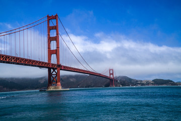 Golden Gate Bridge, San Francisco, California with fog and clouds