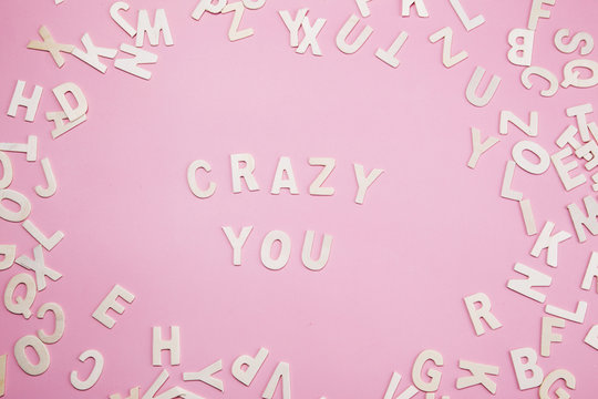 Sorting letters Crazy you on pink.