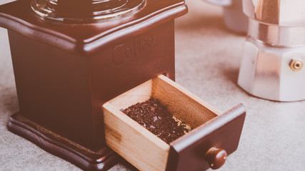 the ground coffee and coffee beans