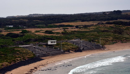 Summerland Bay on Philip Island, Victoria Australia. Place of the Penguin Parade. The main penguin viewing area at Summerland Beach has tiered seating and provides a 180 degree elevated viewing.