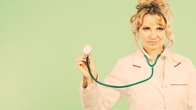Woman doctor with stethoscope.