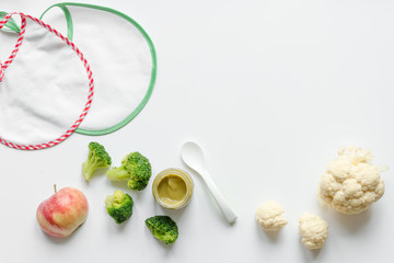 cooking vegetable puree for baby on white background top view