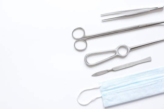 Instruments For Plastic Surgery On White Background Top View