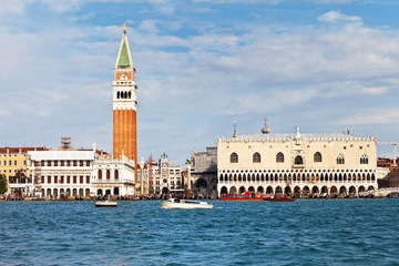 Fototapeta na wymiar View of Venice from the lagoon. Quay and the Piazzetta San Marco, the Doge's Palace, Bell Tower Companile, Sansovino Library, Clock Tower and Bridge of Sighs