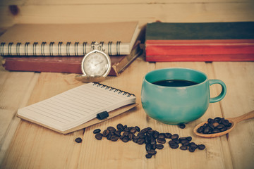 cup of coffee  on  wood table