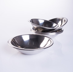 Bowl from stainless steel on background