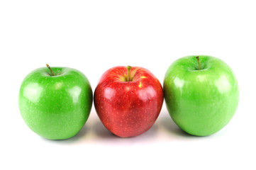 green and red apples on white background