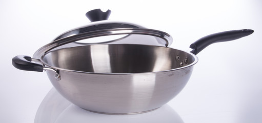 pan or stainless steel pan on background.