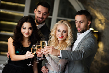 Four friends celebrating