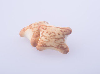 cookies or homemade cookies in shape of bears on background.