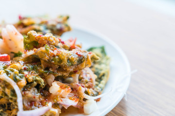 Crispy deep fried morning glory salad with shrimps