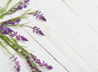 flowers on white wooden background