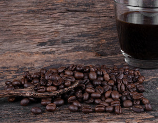 Black coffee isolated on the wooden floor