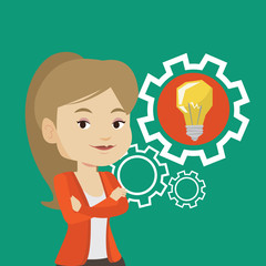 Woman with business idea bulb in gear.