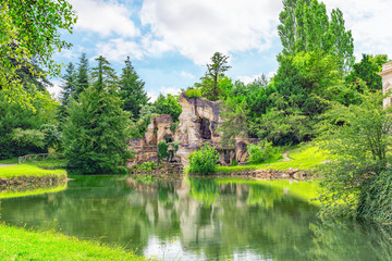 Fototapeta na wymiar Grotto of Apollo in Petit Trianon-beautiful Garden in a Famous P