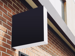 Signboard Shop Mock up Black Sign Display Building exterior brick wall