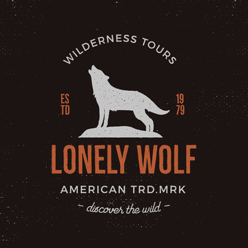 Old style wilderness label with wolf and typography elements. Vintage letterpress effect print. Prints of howling wolf. Unique design for t-shirts. Hand drawn wolf insignia, rustic design. Vector