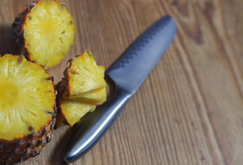 slices pineapple cut knife