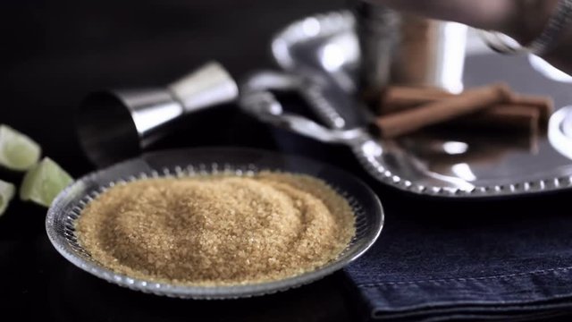 Time-lapse. Egg nog cocktail in glasses rimmed with brown sugar at the minibar