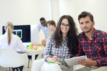 business couple working together on project at modern startup office