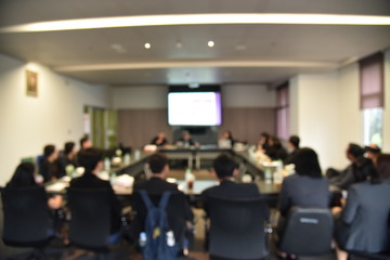 Blurred image of education people and business people sitting in conference room for profession...