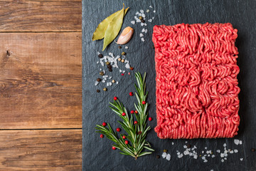 Minced meat  with seasonings and fresh rosemary
