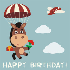 Obraz na płótnie Canvas Happy birthday! Funny horse fly on parachute with gift and flower. Birthday card with horse in cartoon style.