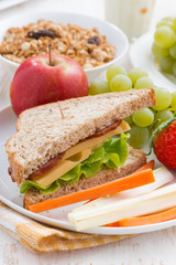 healthy school breakfast with fruits and vegetables, vertical