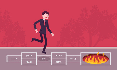 Young carefree businessman playing hopscotch, fire in front