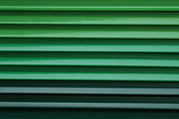 Green pencils of different colors. Background.
