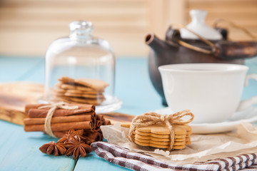 cookies with cinnamon and tea on a table, selective focus, copy space