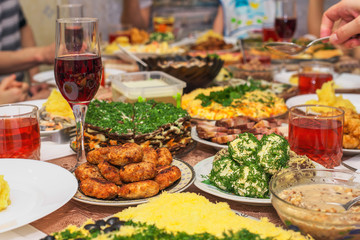 Festive dinner at home, Christmas Day. Bacon, cheese balls, frie