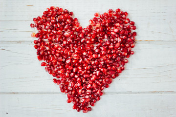 Red heart made from pomegranate seeds - valentines day symbol