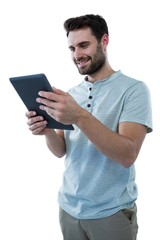 Smiling man holding a digital tablet