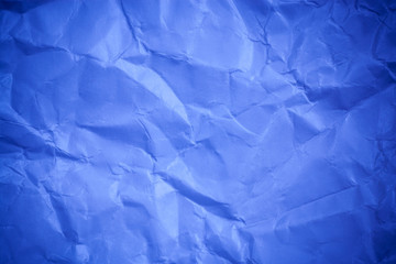 Blue crumpled paper texture background.
